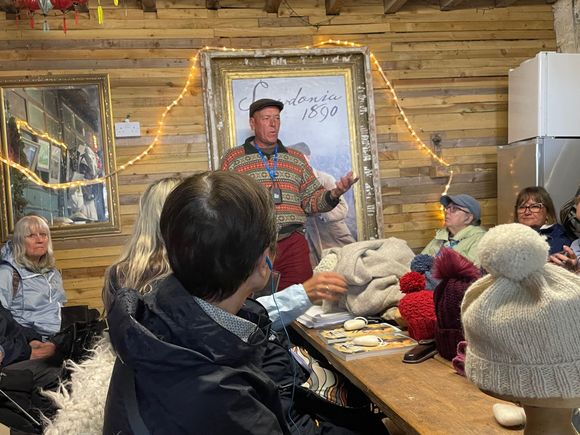 Giving us a lesson about sheep farming.  I don't think you can see it well but there is a big poster for Snowdonia 1890, which was a show he was on
