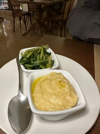 Next arrival, pureed fava beans with cicoria (cooked chicory) on the side..I drizzled the puree with olive oil and add salt...