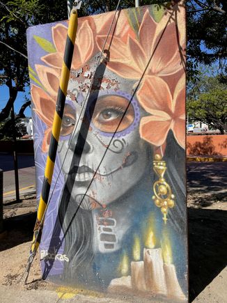 This is a utility box, that has been decorated, looks a lot better than a big GE logo.