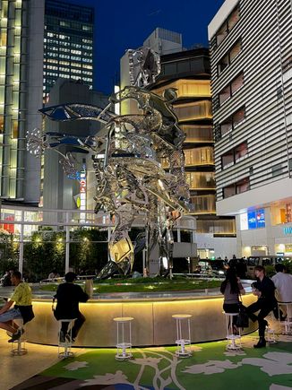 The first thing I saw when we exited the Metro was this statue.  Turns out it was the centerpiece for a bar!