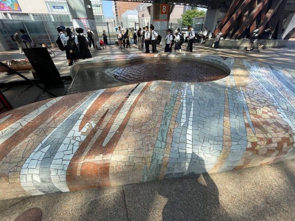 Ceramic water fountain in front of the station