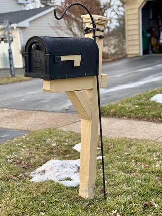 When we got home, I put Ziggy to work! Our wooden mailbox post had rotted and broken off so Ziggy cleverly figured out a way to hold it up until the new one is installed next week.