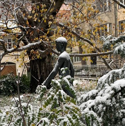 
It snowed today! Our first snowfall of the season. This is a neighorhood sculpture of a young boy who does not seem to mind the snow even tho he has no clothes …