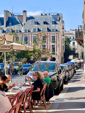 Sidewalk cafe on Place du Vosges.