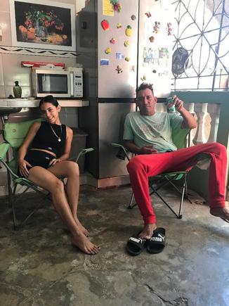 My 17 year old Cuban daughter, Delenys, and my best amigo, Maikel, sitting in our back terrace / kitchen in the morning. 