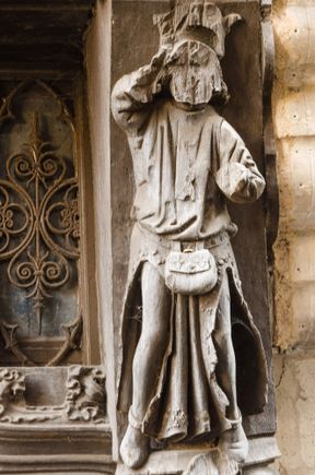 Shutterbugs could look for the square's famed wooden carvings from the Middle ages. Those portray a number of men and woman in starkly unflattering terms. The moneylenders have had their faces cut away, such as shown here @#11. St. Martin is also shown standing atop the back of a poor everyman. Symbolic, no?