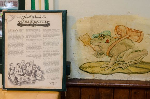 Breakfast in America. The Summerland Beach cafe is a fun, old-school family place. We went there early one morn, after seeing the sunrise. Shown here are its famed list of historic 'Etiquette Rules' beside its fly-hunting frog.