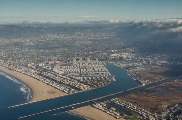 Actually, we flew on United up to Santa Barbara. Above shows our take-off. We see (I think) Playa del Rey and the Marina del Rey peninsula, maybe possibly Venice canal on the far left?