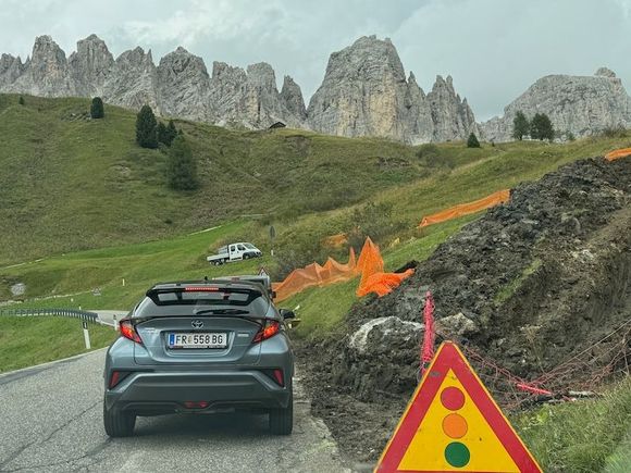 Road construction on the Gardena Pass, on the way back to Colfosco. Gran Cir in the distance.