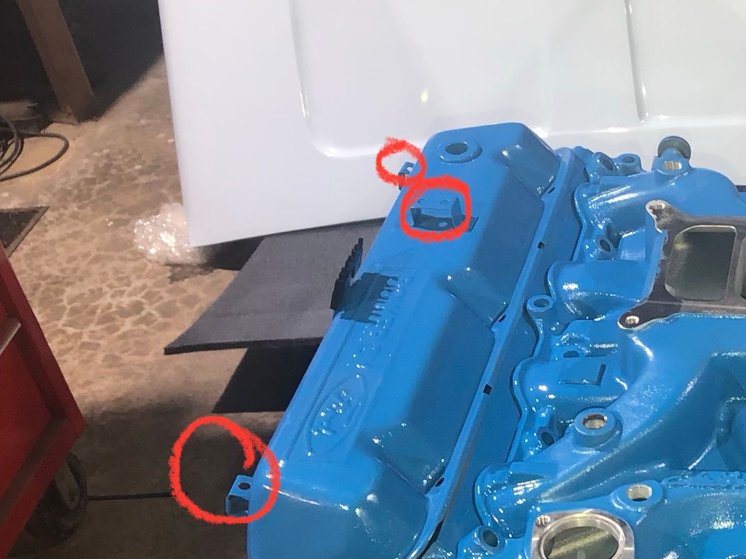 Anyone know what these brackets hold?  They are threaded on one side so you can put a bolt in them.  