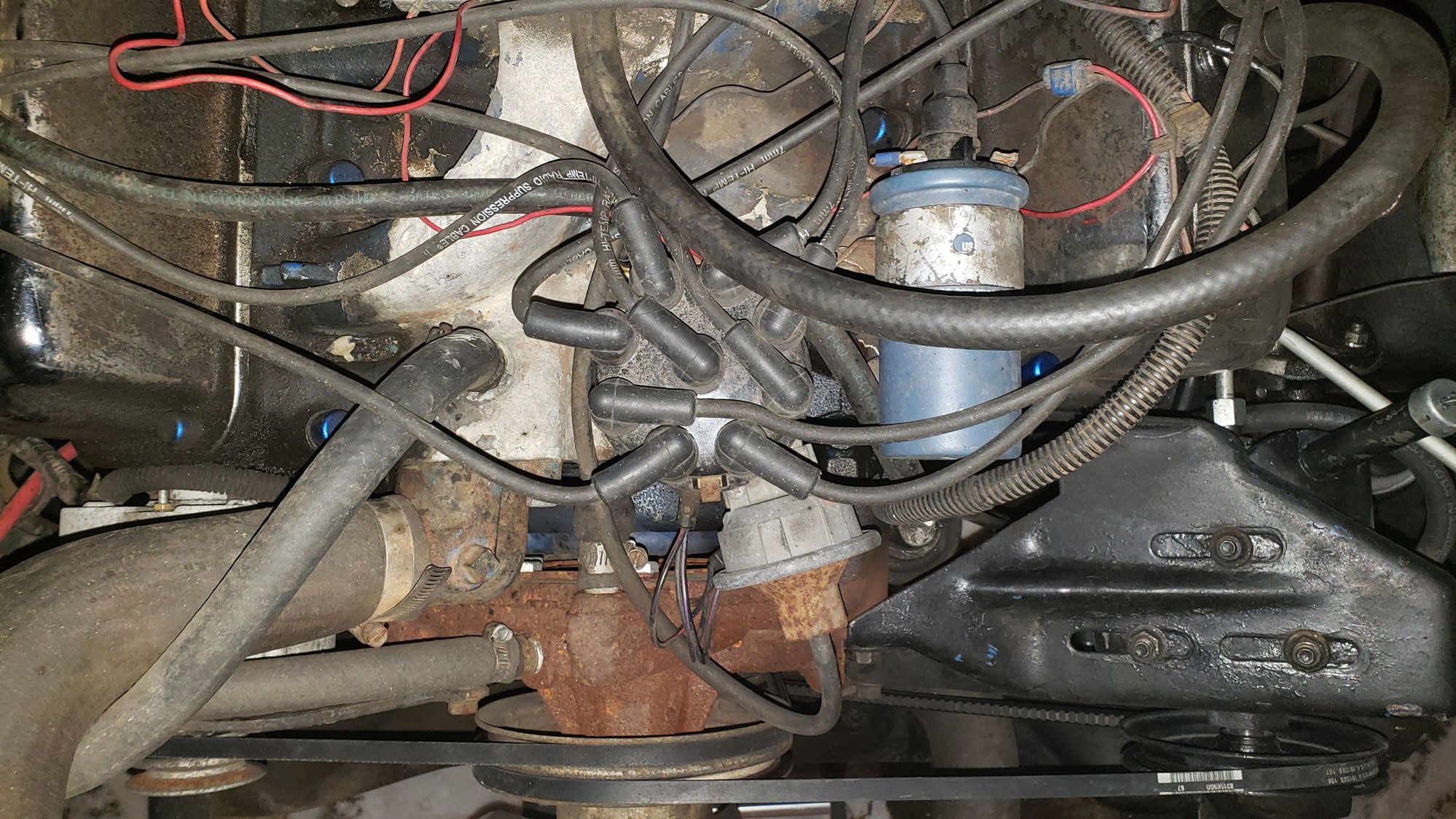 Backfire through carb, only at highway speed after about 10min Ford