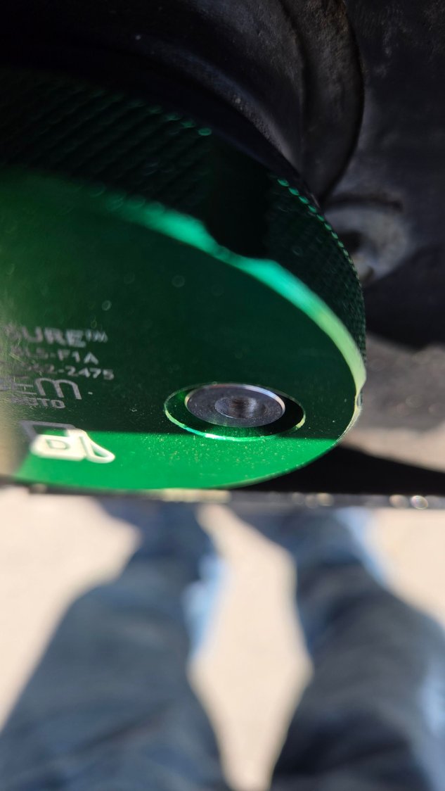 The bolt is down all the way and cap is locked on. 