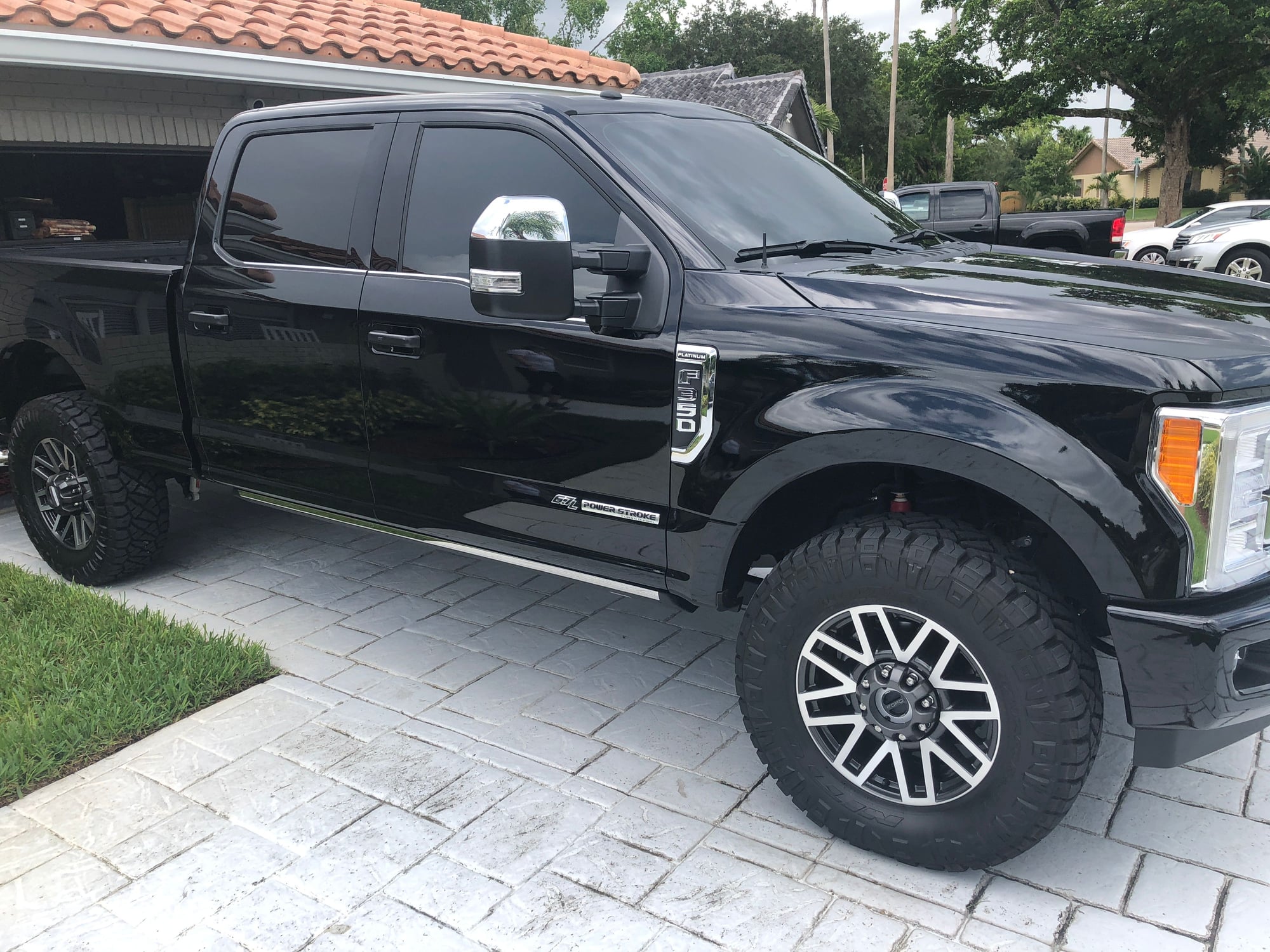 1718 Super Duty Lariat 20s Wrapped In 37 Nitto Ridge Grapplers
