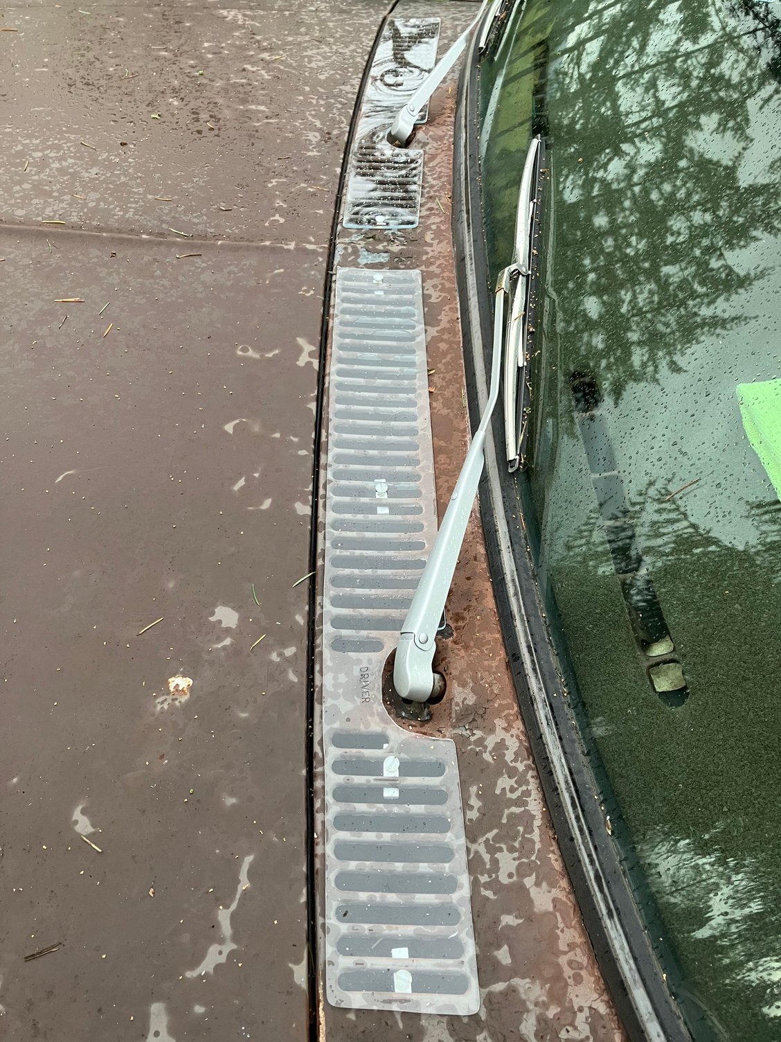 If my paint was worth caring about I�d use 1/4 or so hose cut down one side and slipped over the edges as a gasket. It�d take about 5� per side. 