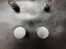 The lobe face on the bad lifter (left) has a shiny circle slightly smaller than a dime. Other than that both liik the same.