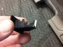Broken USB Connector plate from the old unit...TIP: Use a Zip Tie around the notch to hold the USB connector in place.