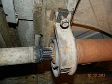 Remove the 2 bolts - one is loose in photo.