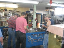 Bellied up to the ongoing Fab/welding table for some serious eating. Left to right Don, Craig, Jim, Tiny.
