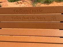 United States Navy bench. 
There were a lot of personal items stuck in the holes in the boulders surrounding the Memorial. Medals, hats, pocket knives, dog tags… kind of a poignant reminder of the sacrifices made for us. 