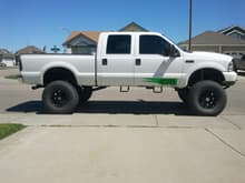 2'' more lift in the front, 3'' in the rear. Total of 11'' in the front, 13'' in the rear. No more tires catching the fenders.