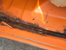 rocker panel rust on drivers side. I am about to repair it.