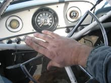 Take your assembled horn ring or button center it over the center of the steering wheel at the seven or eoght oclock position and press down and turn clockwise.  If done correctly it should lock into the steering wheel plate.