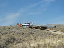 I hauled a 51' section of a cell tower up a mountain. It weighed 6000 pounds. The trailer was a 29' deck.