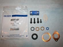 Gasket kit, had to purchase this to get the o-ring I needed.  Kit also includes EGR gaskets and o-ring, turbo drain tube o-rings, turbo oil supply tube o-rings, turbo mounting bolts and EGR coolant tube.