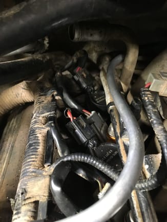 I started out by replacing the black hard plastic line with some 3/8 aluminum line I had left over from a fuel project on my 1974 F250. I am old and the basic shape and then put a new elbow on the back of the intake and a new elbow on the passenger intake and had to splice a little of the previous line in.