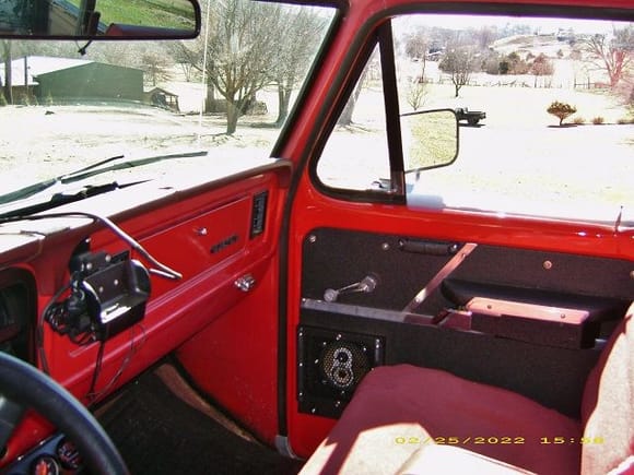Kick panel and dash are OEM Ford "Candyapple Red", Door is a late model Ford E4 "Vermillion Red" like my '07.
