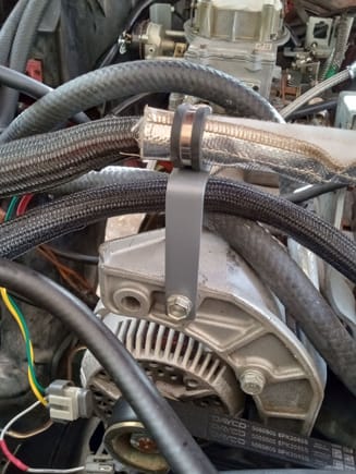 After building this bracket, I went back into the alternator wires.  I Gerry rigged a connection to put the fusible link right off the alternator post.