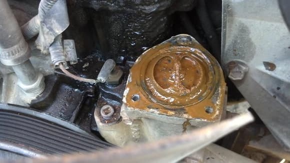 Thermostat sitting on the water pump. still need to replace water pump.