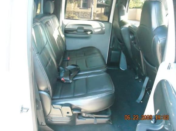 Leather Folding Rear Seats w/ fold down arm rest from an '06 F250 (I researched the V.I.N. and YES they're real leather)