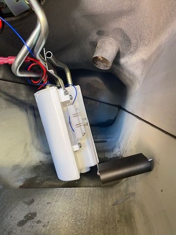 first Spectra pump. Lock ring wouldn't fit without removing strainer, sender float hits side of tank.