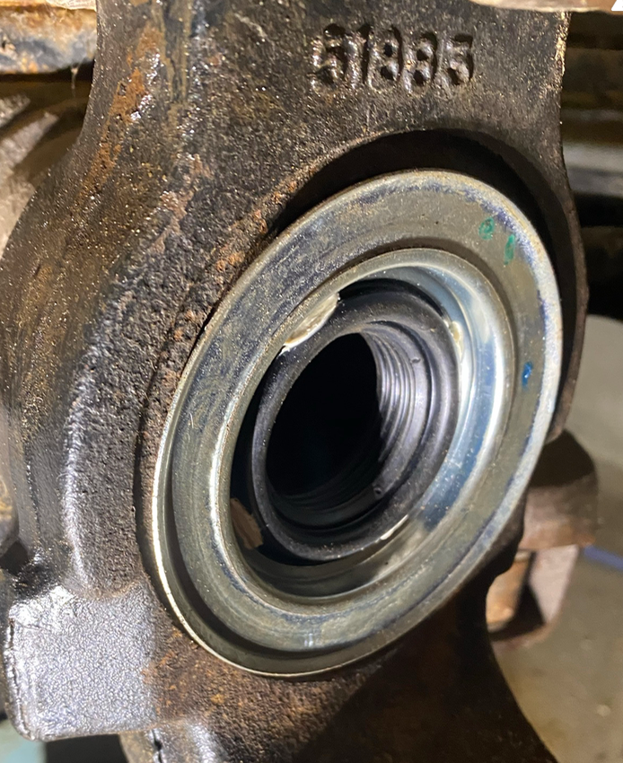 Inner axle seal / dust shield, correct replacement part pic Ford