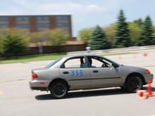 '98 Mazda Protege. (our actual car)
1.5L 5 speed. The boys learn to drive stick shift with it and I take it to the autocross on occasion.