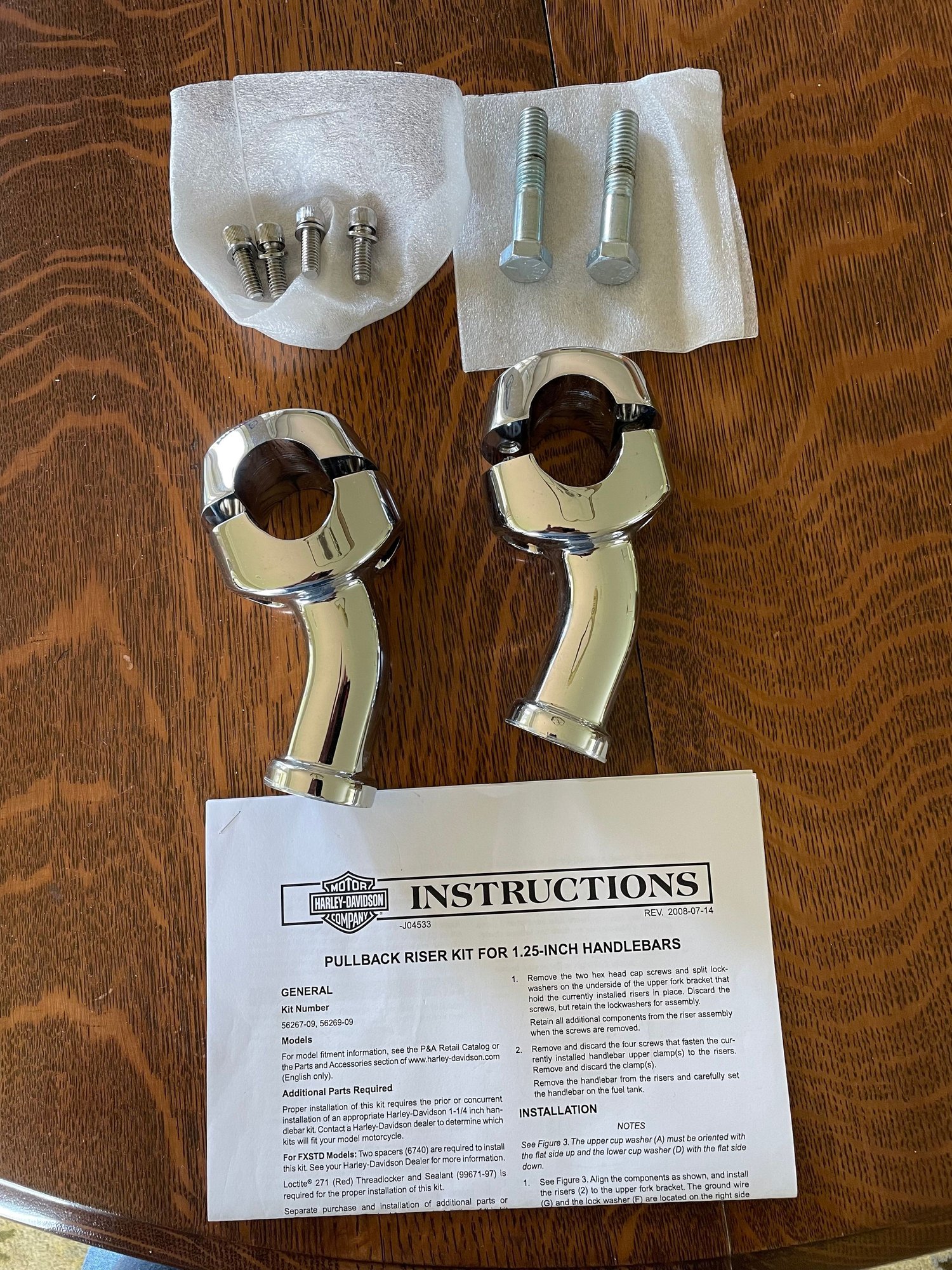 Curved Pull Back Fat Riser P/N 5626909 Harley Davidson Forums