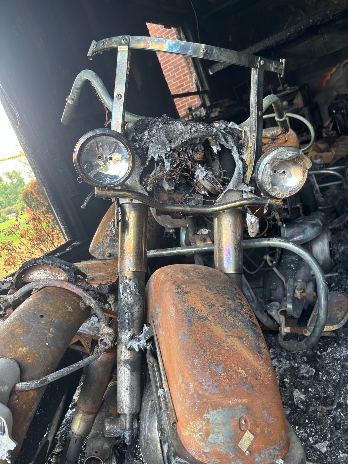 Burned all over. I�m considering keeping it and rebuilding it again although it�ll be difficult to find original parts and all to make it what it was. Since it�s so scorched and all the chrome is burned, I don�t know if it�s worthwhile to do. Has anyone had an experience of dealing with this?