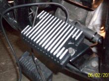 New voltage regulator in place. Note clutch cable clip and zip tied wrap on voltage regulator plug wires. I reused this from the original voltage regulator.