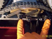 Replacing the automatic tensioner bolts. I used blue Loctite on the threads. Don't forget the spacers between the tensioner and the primary case!