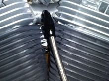 -6 elbow and hose which goes to a Krank Vent under the motor