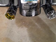 Pipe tips turned yellow from oil used in muffler packing immediately after start up.  Cleaned of with Nevr dull and 0000 steel wool