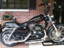 New bars, tank lift, coil/ignition relocation