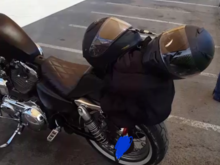 Ill have my girl put my jacket on so its over hers and shell run the cable through one sleep. Ill wrap them around my sissy bar. Place helmets on seat and one ontop of the sissy bar and run the cable through the chin guards and wrap them around the sissy bar and lock them w the carabeaner. Looks like a neat lil package.