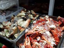 Lots of excellent selection of fresh fish, octopus, squid, crab, snapper and even lion fish. Load up with any combination and they will price it and cook it!