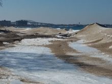 The shore of Lake Huron looking west.
And yes, those are snow and ice mountains on the shoreline!