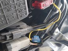 The Yellow  wire was spliced to the Red/Yellow wire, switched power, behind the P&A connector under the left side panel.