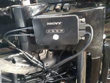 Easily accessed when HB's are turned full left.  If you look close you can see the power module affixed to the frame with the automotive high strength double stick tape tucked in behind the large main harness.