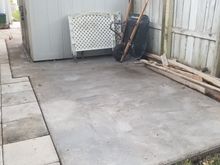 The existing Shed before being moved up toward the grass.