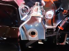 It has to be something inside this mount where main valve is and the saddlbag attaches. This is the part that I don't know how to get at without taking the rear fender bracket off. Any ideas? Thanks 